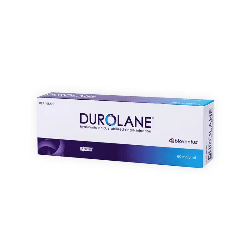 Photograph of a DUROLANE® package, a medical product designed for hyaluronic acid injections. The box is predominantly white with accents in blue and purple, showcasing the brand name along with content details: "60 mg/3 mL" and product reference REF 1082010.