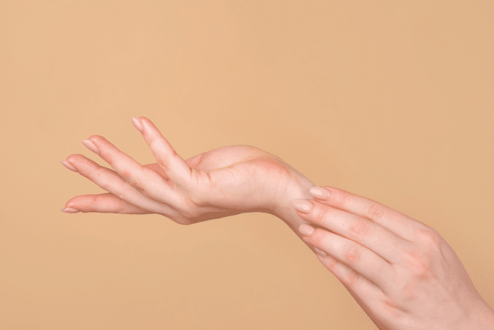 Hands demonstrating Juvederm's rejuvenation effect